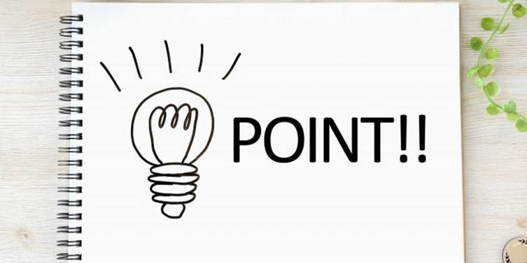 ノートに描かれた電球と“POINT!!”の文字、アイデアや重要なポイントを示すイメージ